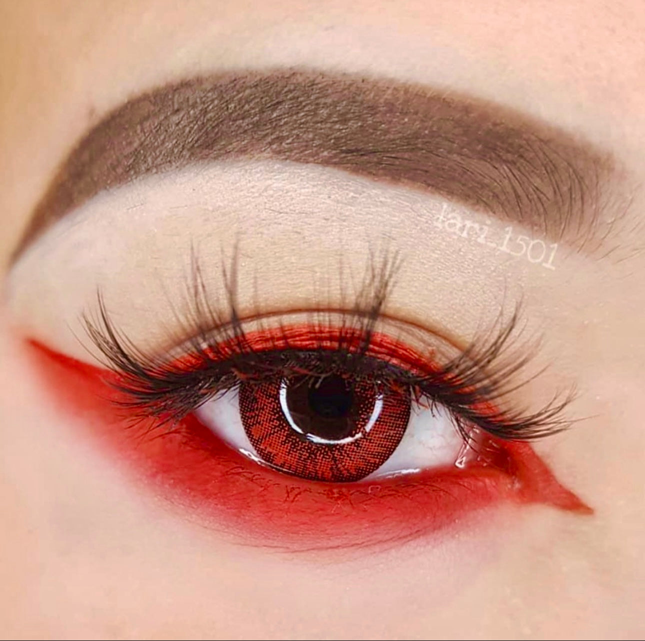 Bright red natural cosplay contacts close up